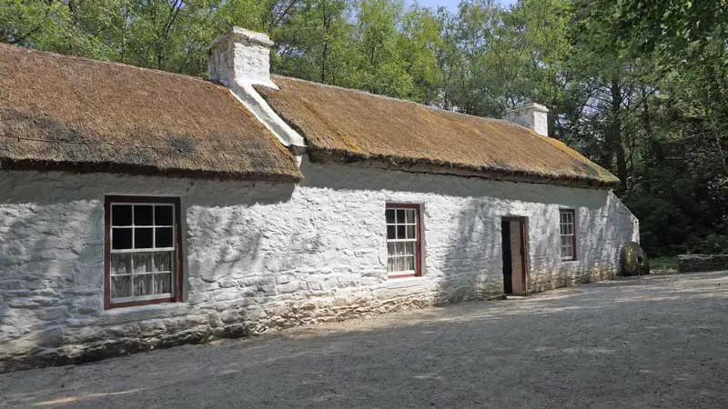 A cottage which has been limewashed for protection.