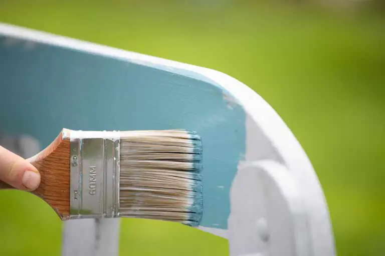 applying-blue-chalk-paint-with-a-paint-brush