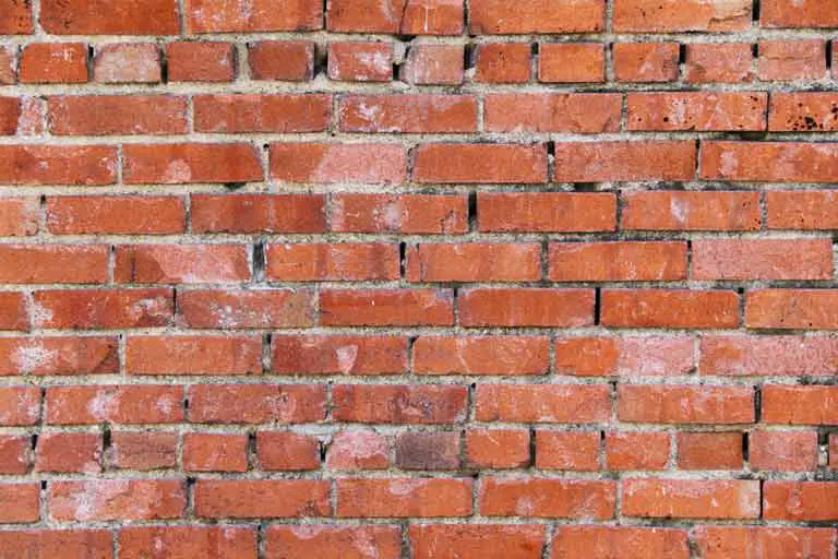 crumbling-mortar-on-brick-wall